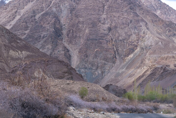 Scenic view of the Himalayas and Ladakh ranges. Beautiful barren hills in Ladakh.View from the road from Nubra Valley to Turuk. Siachen area in Leh Ladakh.