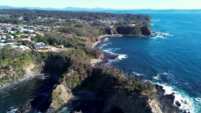 Drone aerial scenic housing rocky landscape coastline headland view housing Malua Bay Batemans Bay NSW South Coast travel tourism Australia 4K