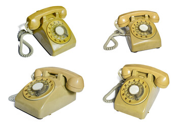 Old  yellow telephone on white background,clipping path