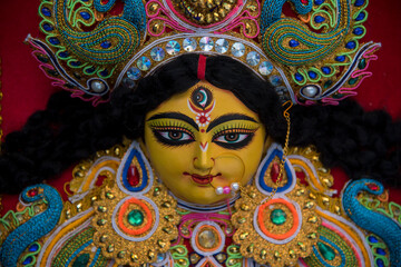 Decorated idol of Hindu Goddess Durga with use of selective focus 