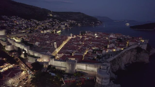 Coratia Aerial: Dubrovnik at dusk, glowing streets, and Adriatic Sea