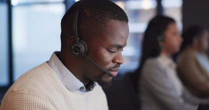 Call center, customer service and man consultant in the office doing online crm consultation. Contact us, headset and professional African male technical support agent working in modern workplace.