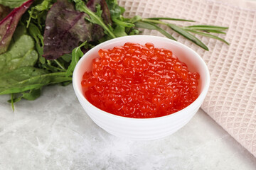 Red caviar in the bowl