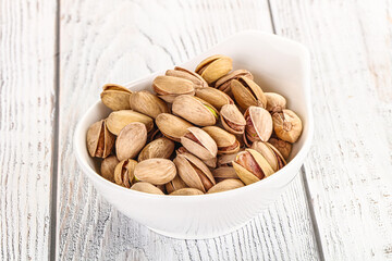 Salted tasty pistachio nuts heap