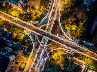 Aerial view of busy city intersection at night