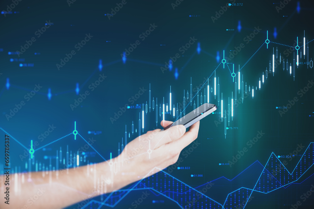 Poster close up of businessman hand holding cellphone with glowing candlestick forex chart and index hologr