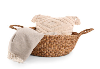 Wicker basket with cushion and blanket isolated on white background