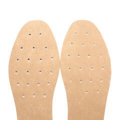 Pair of orthopedic insoles isolated on white background, closeup