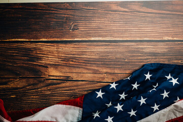 Aerial perspective American flag on dark concrete, a timeless symbol of democratic values and honor.