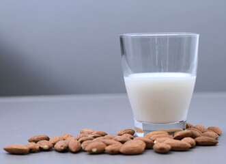 Almond milk with almond nuts on table no people stock image stock photo