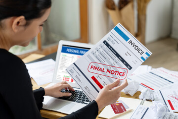 Stressed young woman has financial problems with credit card debt to pay uttermost show concept of...