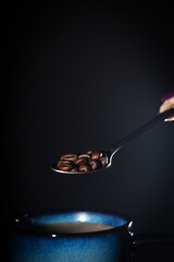 spoon with a coffee bean