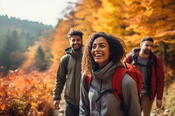 Group of diverse friends enjoying a mindful autumn hike, surrounded by vibrant fall foliage