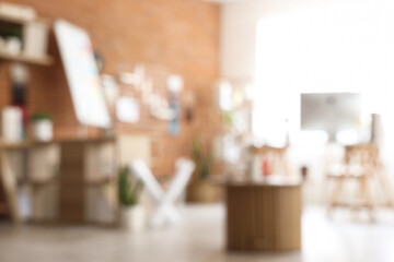 Blurred view of office with workplace