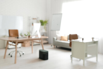 Fototapeta na wymiar Blurred view of office with workplaces