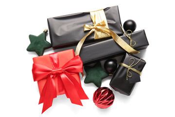 Many gift boxes and Christmas balls on white background