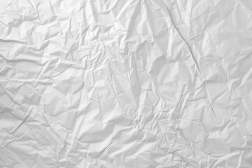 Blank white crumpled paper texture background. Creased paper poster texture.