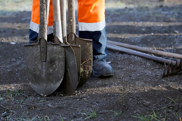 person with shovel