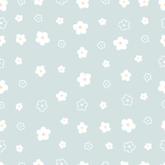 Seamless pattern Flower background randomly placed on a blue background Hand drawn design in cartoon style, used for fabrics, textiles, publications, gift wrapping, vector illustration.