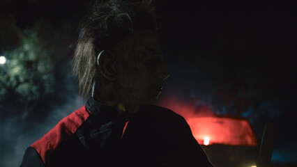 Horror mask in the dark night.