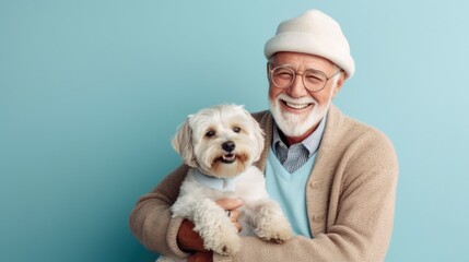 This studio portrait captures the special connection between a senior man and his dog.