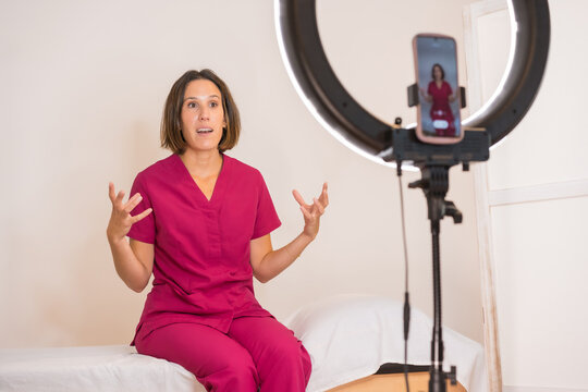 Doctor recording a tutorial of nutrition from home