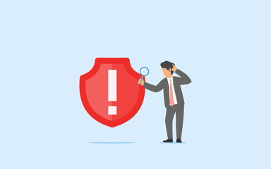 risk assesment concept. Guessing the consequences of decisions. a businessma nholding a magnifying glass in front of alert sign. 