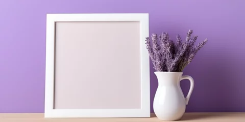 Foto auf Acrylglas Empty photo frame mock up with purple lavender flowers on a shelf with lavender in a vase © TatjanaMeininger