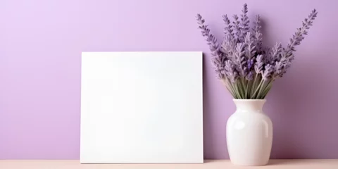 Foto op Canvas Empty photo frame mock up with purple lavender flowers on a shelf with lavender in a vase © TatjanaMeininger