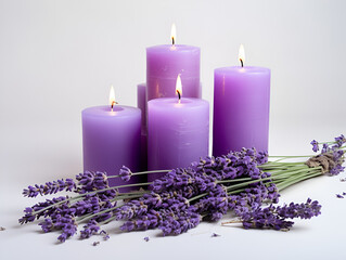 Obraz na płótnie Canvas Purple aroma lavender candles on white table, mock up product with copy space