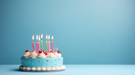 Birthday cake with seven candles on pastel blue background 