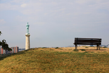 bench in the park and Victory statue in Belgrade