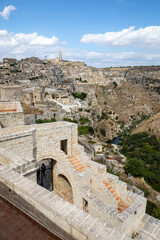 View of the Sassi di Matera a historic district in the city of Matera, well-known for their ancient cave dwellings. Basilicata. Italy