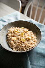 Butter rice, simple comfort japanese dish consisting in a portion of steamed rice with butter and a pinch of soy sauce