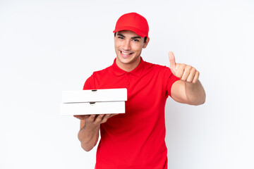 Pizza delivery caucasian man with work uniform picking up pizza boxes isolated on white background...