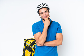 Young caucasian man with thermal backpack isolated on white background smiling