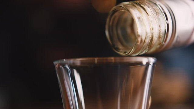 Cooking an alcoholic shot close up