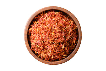 Dried safflower in wooden bowl, Top view - obrazy, fototapety, plakaty
