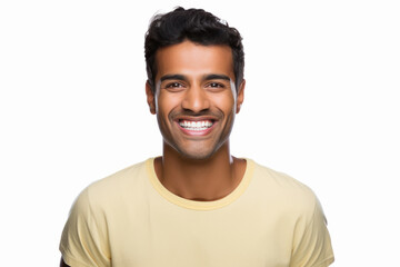 Smiley face of young indian man on white background. - obrazy, fototapety, plakaty