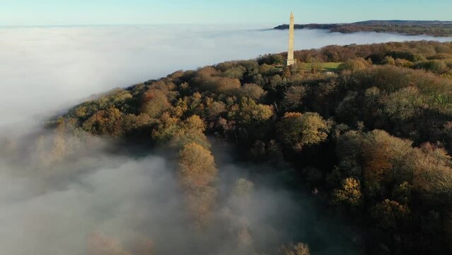 Aerial of the Wellington Monument above a sea of mist, Wellington, Somerset, England