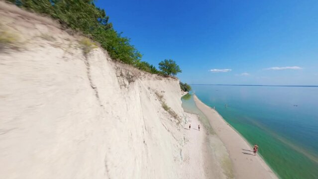 FPV, Ukraine, View from the mountain Pivikha on the Kremenchuk water reservoir near Svitlovodsk, Kirovograd region, Ukraine. Natural background in a sunny summer day.