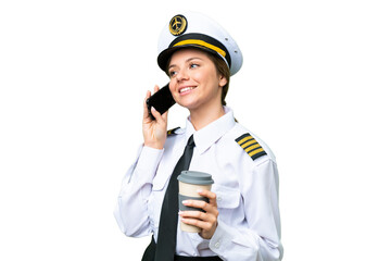 Airplane pilot woman over isolated chroma key background holding coffee to take away and a mobile