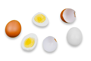 Single whole egg, cracked egg, white egg and halved boiled egg with yolk