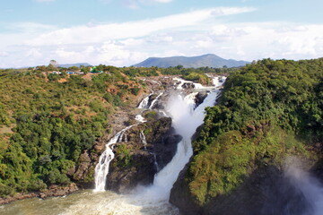 Fototapeta na wymiar Shivasamudram falls, Karnataka, India. The Shivanasamudra Falls is on the Kaveri River after the river has wound its way through the rocks and ravines of the Deccan Plateau