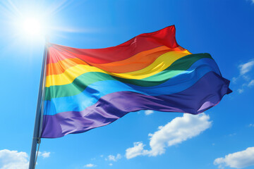Vibrant rainbow flag flying high in sky, symbolizing pride and inclusivity. Perfect for LGBTQ events and celebrations.