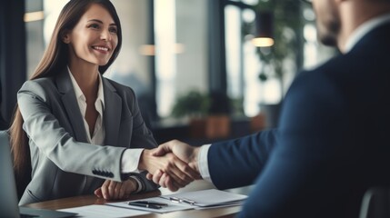 job interview,Handshake,finishing successful meeting,Business etiquette,congratulation,meeting,new business,startup,employee,teamwork,trust concept.Young business people shaking hands in the office.