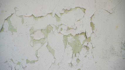 Texture. White wall with cracks. Scuffs