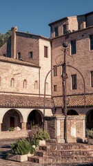 Fototapeta premium View of the cloister of ancient abbey in the Marche region, Italy
