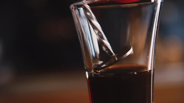Cooking an alcoholic shot close up