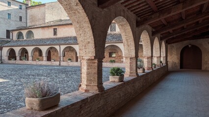 View of the cloister of ancient abbey in the Marche region, Italy